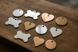 Various ultra-thin dog tags for small breeds, highlighting finish and color differences for owners choosing the right style.