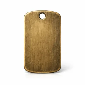 A classic dog tag made from solid brass with an antique brass finish, featuring a brushed texture and a single hole for chain attachment. The design includes rounded corners for a soft, comfortable look.