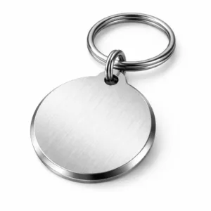 A round bag tag crafted from brushed stainless steel, featuring a refined beveled edge for added elegance. Attached securely with a split ring, ideal for durable and stylish identification on bags.