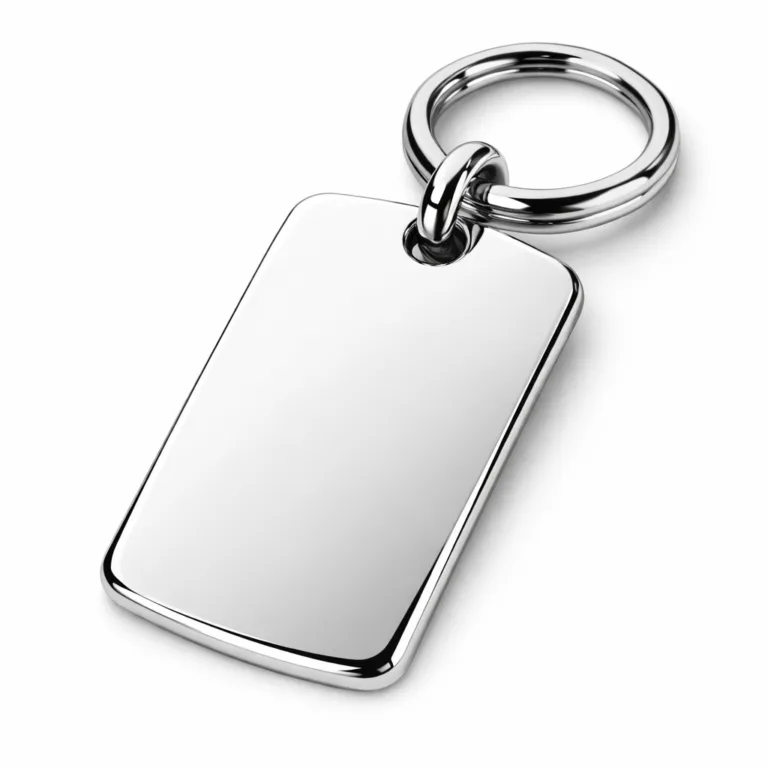A premium mirror polished stainless steel bag tag with rounded corners and a blank emblem engraving, perfect as a luxury brand accessory.