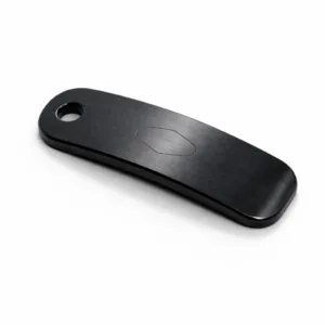 A modern matte black stainless steel bracelet tag featuring a brushed surface texture, rounded corners for comfort, and a single hole for easy attachment. The tag showcases a blank emblem engraving suitable for custom marking.