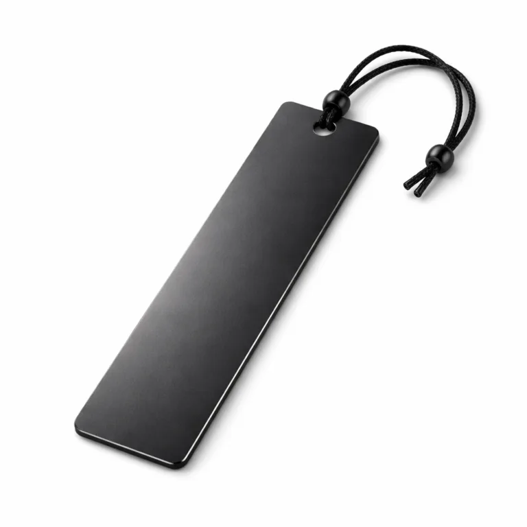 A refined black anodized aluminum bookmark tag with a mirror polished surface and sleek beveled edges. The high-gloss finish and smooth form-factor present a premium visual statement.