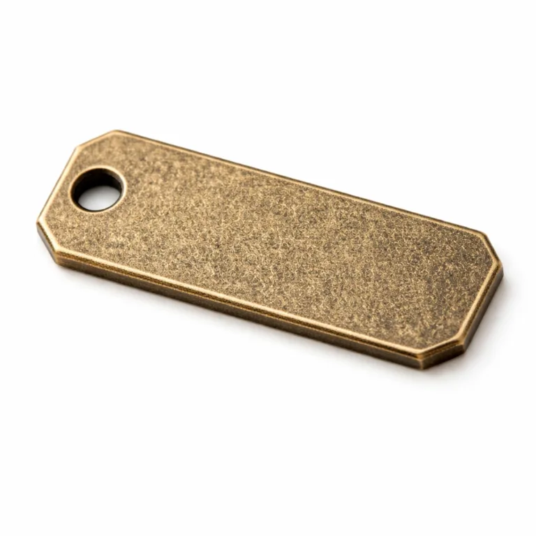 Antique brass bracelet tag features a sandblasted matte surface, elegant chamfered edge, and a single hole, ideal for vintage-inspired jewelry pieces.