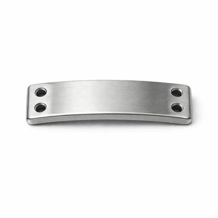 A robust bracelet tag constructed from brushed stainless steel, featuring a matte finish and a slightly thicker profile for added durability. Designed with two sewing holes for easy attachment onto fabric or leather bands.