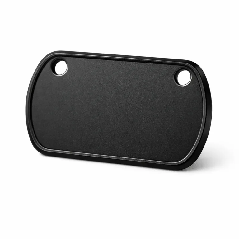 Durable military-style dog tag crafted from anodized aluminum with a matte black finish, showcasing double holes and beveled edge detail, perfect for a modern look.