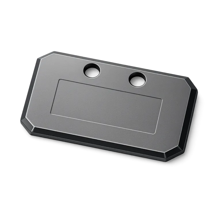 A lightweight anodized aluminum bag tag in a matte finish, designed with beveled edges and a subtle debossed area for logo application. Features two small holes for versatile attachment options.
