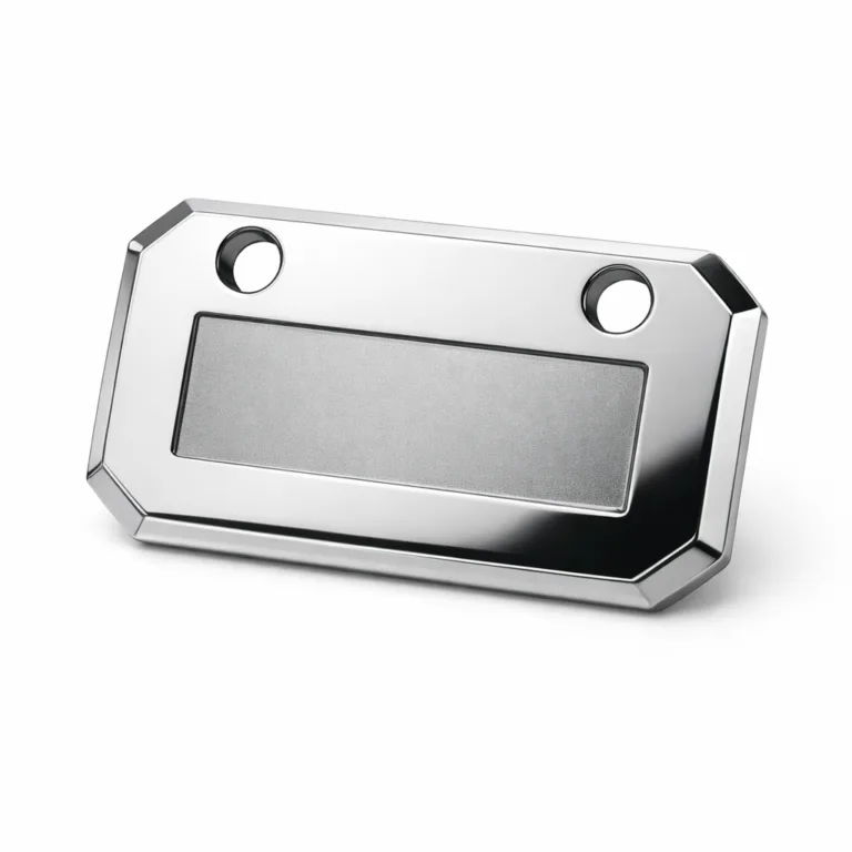 Die-cast bag tag emblem in anodized aluminum with a mirror polished surface and beveled edges, displaying a deep laser-engraved blank emblem panel and two holes designed for secure split ring attachment.