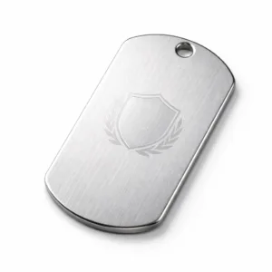 High realism studio photo of a brushed stainless steel dog tag, rectangular with rounded corners, featuring a single chain hole and blank emblem laser-engraved at the center. Ideal for custom metal identification.