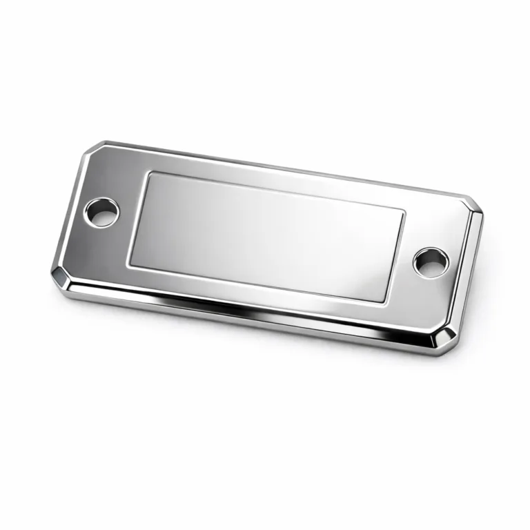 Anodized aluminum garment tag with a bright mirror polished finish and chamfered edges. Features debossed surface detail and double sewing holes for secure garment attachment.