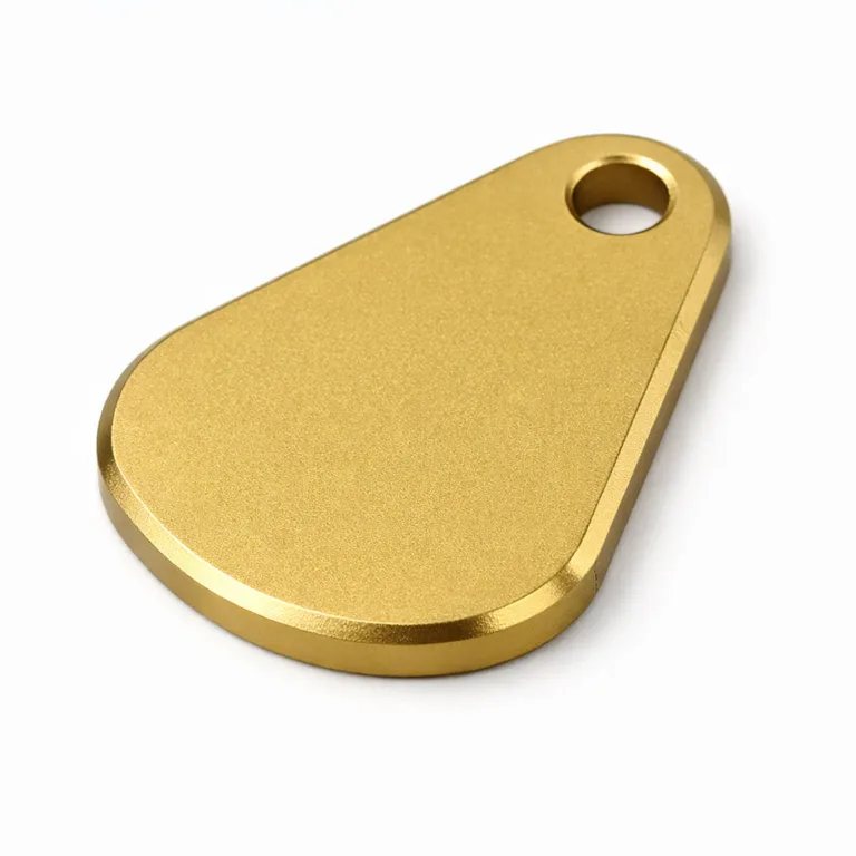 A lightweight anodized aluminum keychain tag featuring a matte sandblasted surface for a contemporary look. The beveled edge provides a refined finish, while a single hole allows for easy attachment to a split ring. Perfect for minimal and modern key organization.