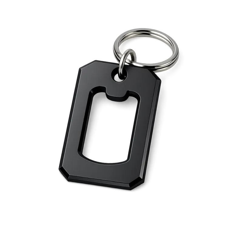 A sleek keychain tag crafted from black anodized aluminum, featuring a matte finish, beveled edge for modern appearance, and a sturdy split ring. Displayed on a white background with high realism and sharp focus.