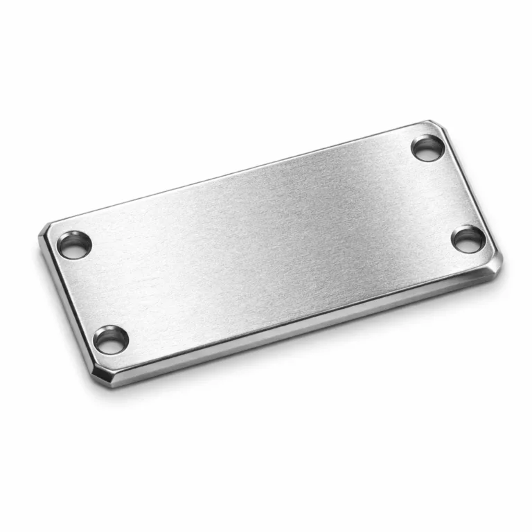 A sleek logo tag manufactured from brushed stainless steel, featuring a sandblast matte texture, beveled edges, and double mounting holes for secure attachment. The tag is ideal for professional branding on fashion or equipment.