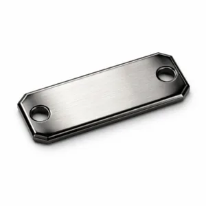 Rectangular logo tag in brushed stainless steel with beveled edges, double holes for secure mounting, and a black nickel etched finish. Ideal for durable brand labeling applications.
