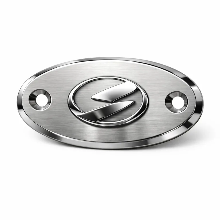 A realistic brushed stainless steel logo tag featuring a mirror polished surface, beveled edge detailing, and double mounting holes for secure attachment. The logo area is raised in a blank emblem style, ideal for branding applications.