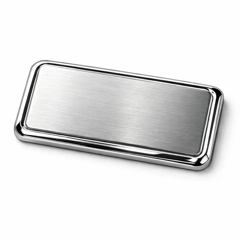 High realism product photo of an embossed logo tag crafted from brushed stainless steel. The tag features a mirror polished surface and rounded corners, showcasing quality for branding applications. Ideal for main e-commerce images.
