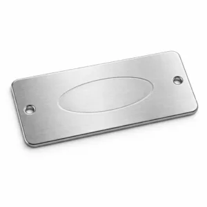 A high-realism photo of a stamped logo plate made of brushed stainless steel, featuring a blank embossed logo shape, gently rounded corners, and double holes for versatile attachment. Ideal for branding and identification needs.