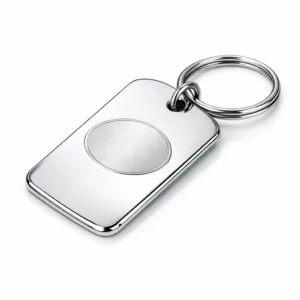 A stainless steel luggage tag in mirror chrome finish, featuring rounded corners and a subtle laser engraved blank emblem. Includes a split ring for easy attachment. Captured on a white background with sharp details, ideal for e-commerce display.