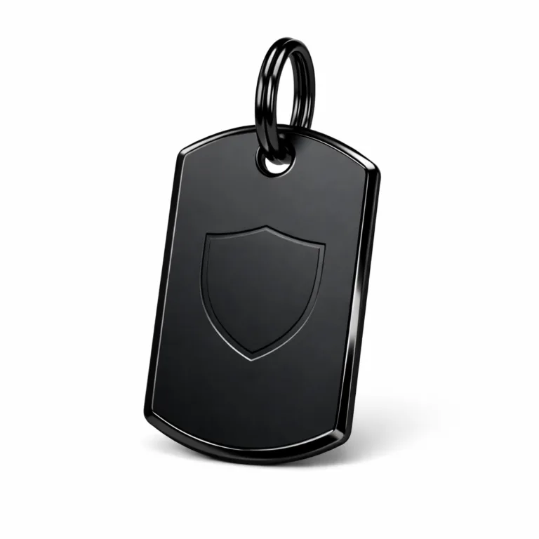 A mirror polished black nickel plated keychain tag with a sleek chamfered edge and a subtle blank emblem embossed on the front for visual appeal. High-gloss finish elevates its modern style.