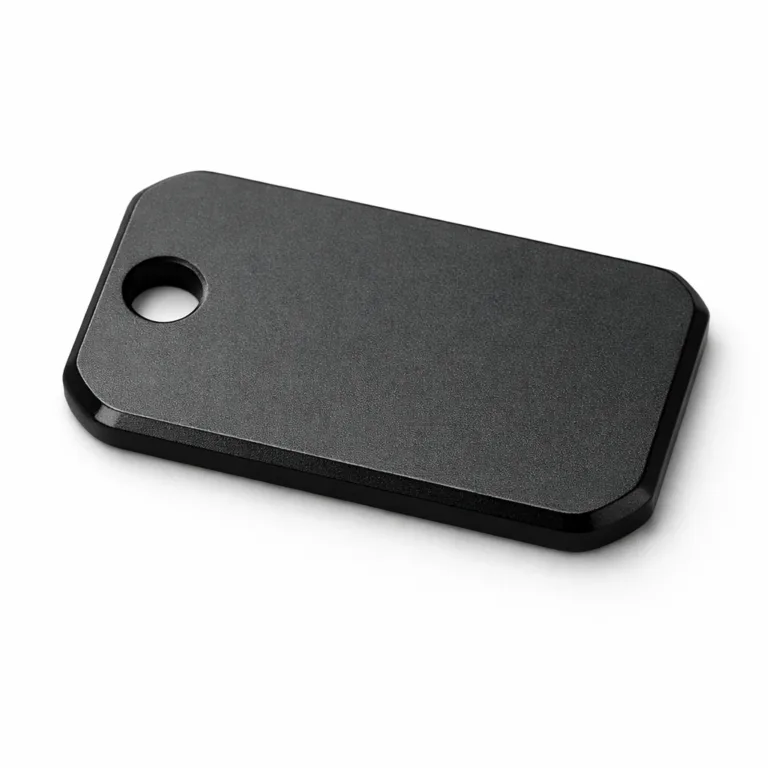 This variant of the matte black keychain tag is crafted from anodized aluminum with a sandblasted matte finish. Features a beveled edge for extra detail and a single hole for custom attachment.