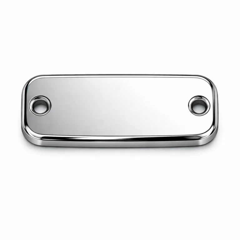 A high-shine matte nickel logo tag made with anodized aluminum, featuring a mirror polished surface, etched emblem, increased thickness, and double rivet holes for attachment.
