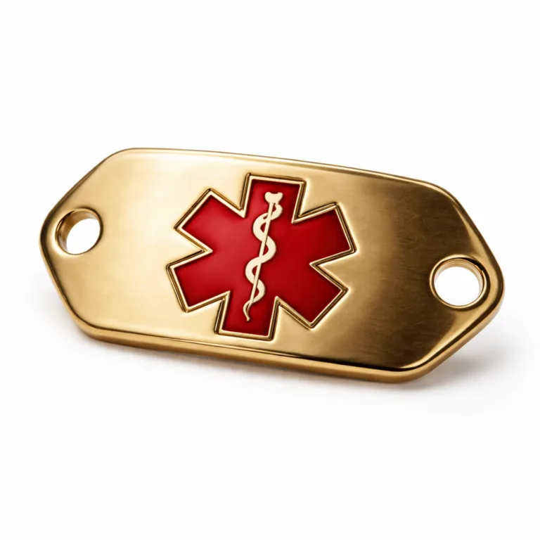 A premium medical alert bracelet tag with antique brass plating and a mirror polished surface. The debossed front emblem is filled with soft enamel for visual emphasis. Extra thickness and rounded corners enhance both durability and appearance. Single holes for bracelet attachment are included.