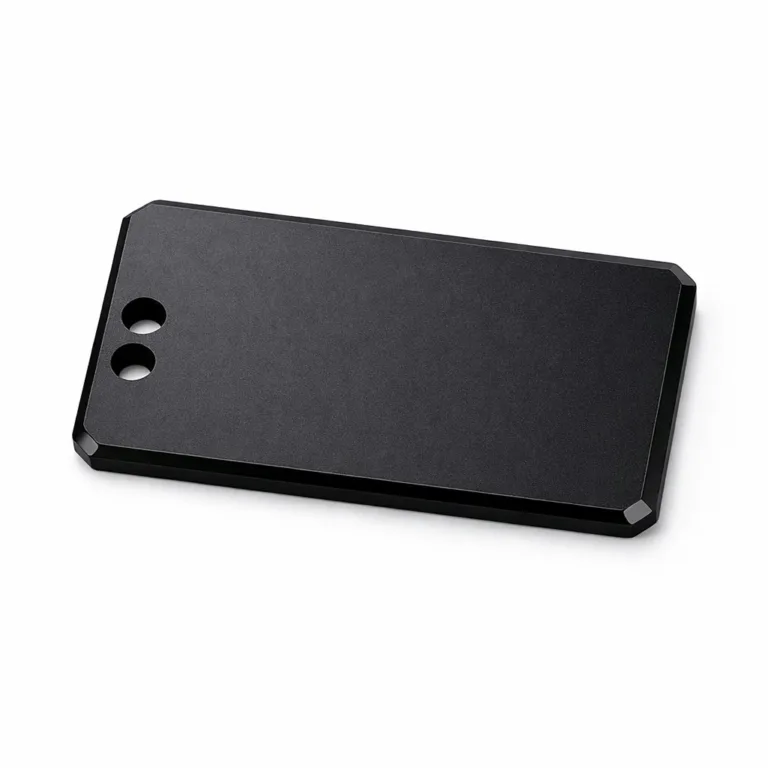 A modern rectangle bag tag crafted from anodized aluminum with a matte black finish. Features beveled edges and two precision-drilled holes for versatile attachment.