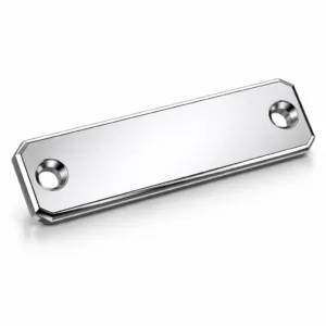 A highly reflective mirror chrome logo tag made from stamped aluminum, featuring precise beveled edges and double mounting holes for easy attachment. Ideal for branding applications, displayed in a professional studio setup.
