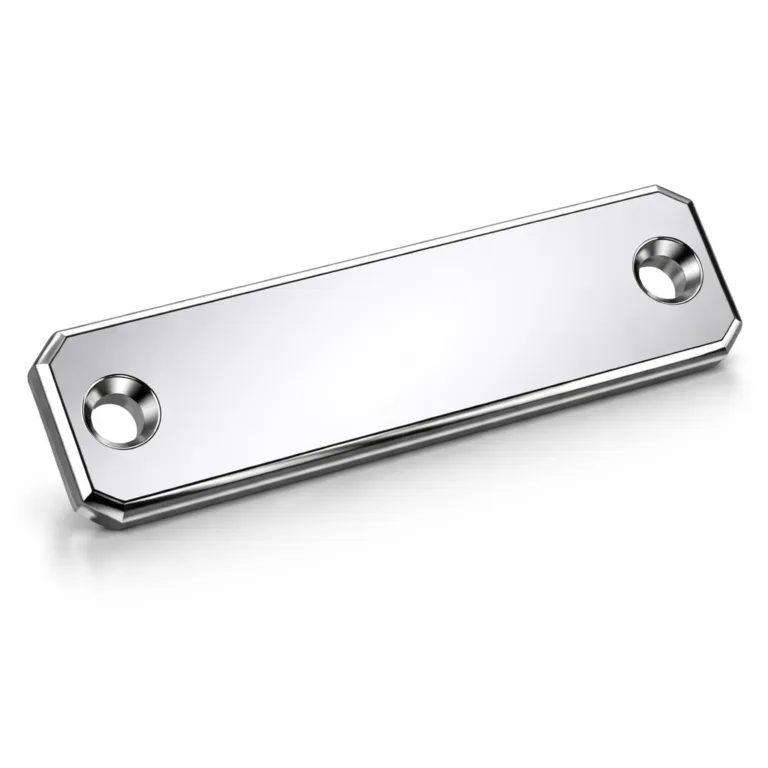 A highly reflective mirror chrome logo tag made from stamped aluminum, featuring precise beveled edges and double mounting holes for easy attachment. Ideal for branding applications, displayed in a professional studio setup.