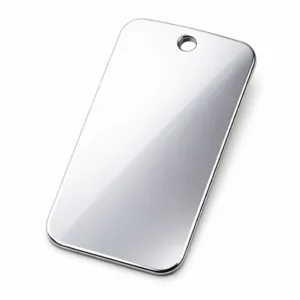A highly reflective stainless steel garment tag featuring a mirror polished finish and rounded corners, with a single hole for sewing, photographed in a studio with crisp e-commerce lighting.
