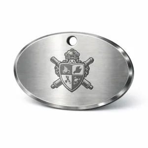 This variant features a brushed stainless steel oval bag tag with a beveled edge, presenting a modern and durable look. The front showcases a laser engraved emblem, and a single hole for easy attachment.