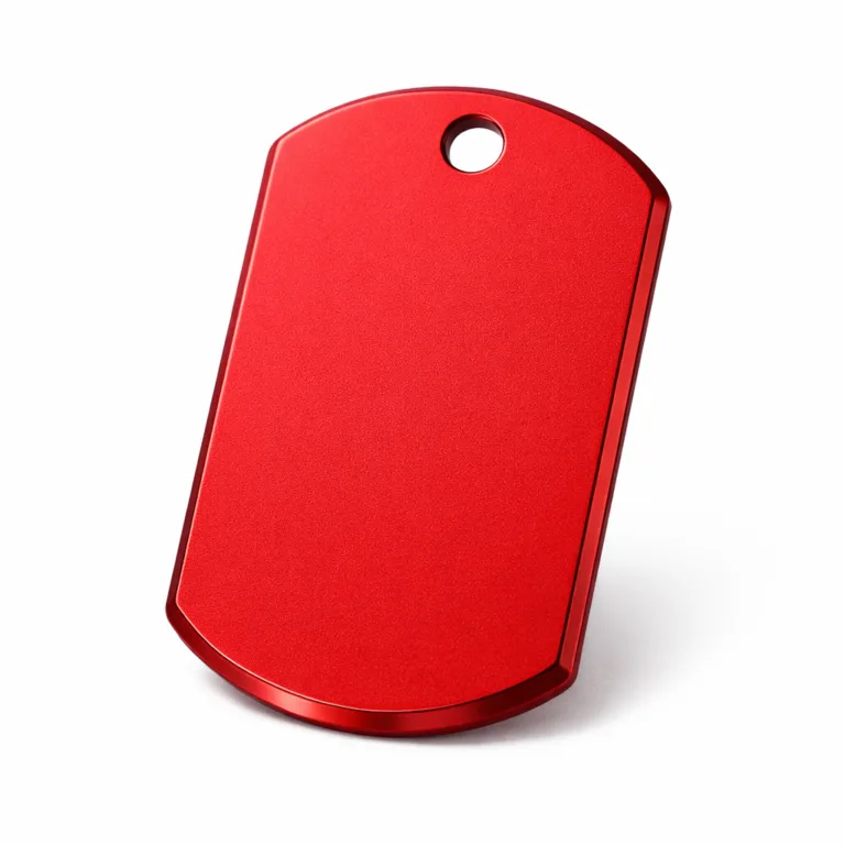 A lightweight, anodized aluminum dog tag with a vibrant matte red surface, beveled edges for a refined touch, and a single hole suitable for a ball chain. The tag evokes modern style and durability, highlighted on a clean white background.