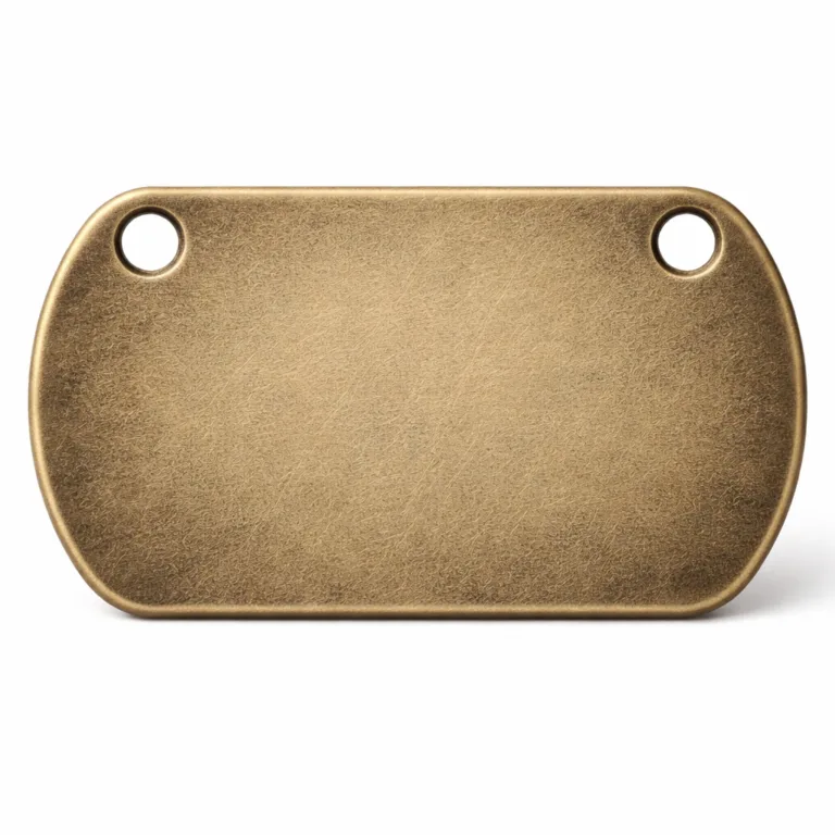 A dog tag featuring an authentic antique brass appearance with a sandblasted matte surface for a tactile, vintage effect. The design includes double holes for various attachment options, ideal for classic and custom styles in pet tags.