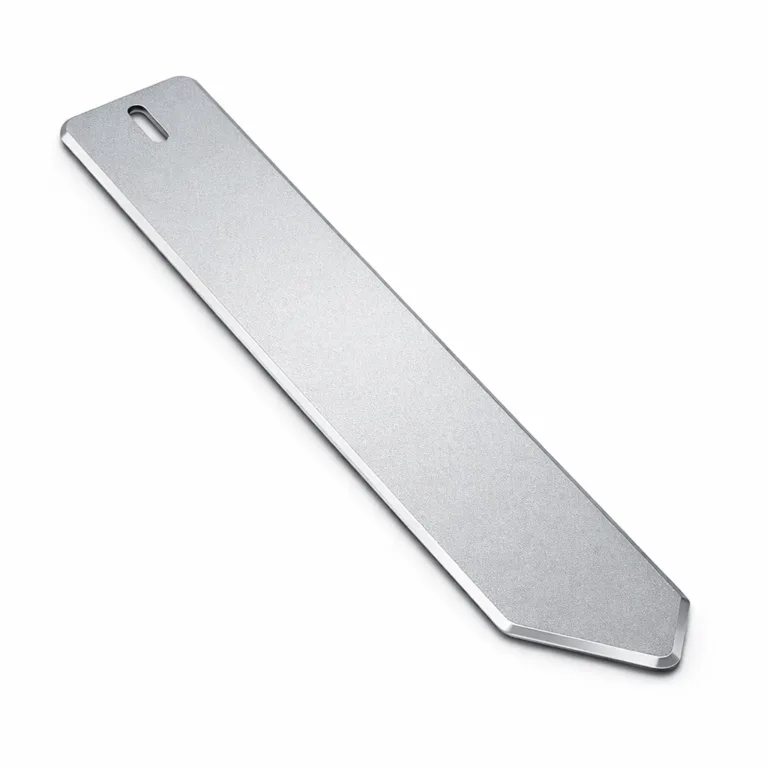 A premium bookmark tag in anodized aluminum, showcasing a sandblasted matte texture, beveled edge for a refined touch, and lightweight feel.