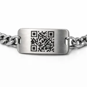 A stainless steel QR code bracelet tag with a brushed finish and rounded corners, showcasing a laser engraved front surface. Ideal for commercial use, captured in high realism studio photography.