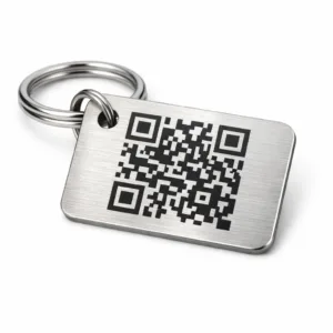 A keychain tag manufactured from brushed stainless steel, featuring a single hole for attachment and a laser engraved QR code pattern. The tag has rounded corners for a modern, smooth appearance—ideal for durable everyday use.