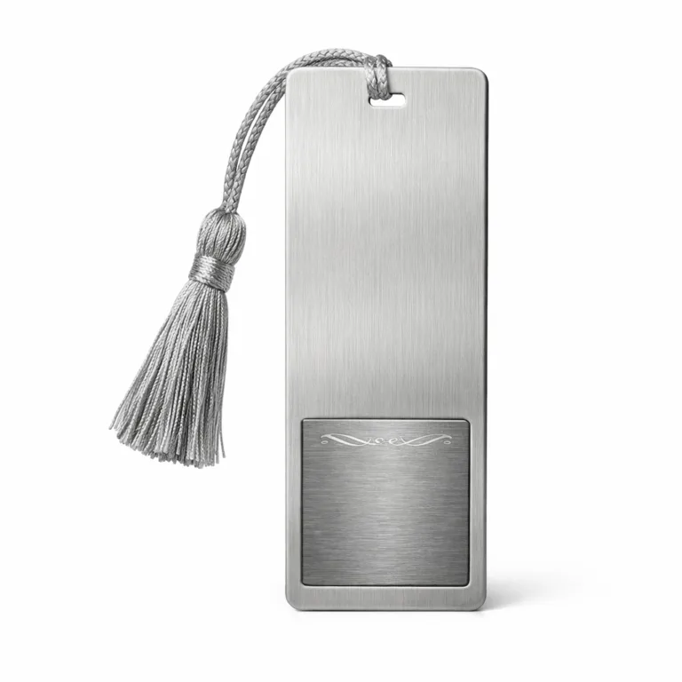 A high realism product photo of a brushed stainless steel bookmark tag, featuring rounded corners and a laser engraved quote panel. Ideal for use as an elegant and durable metal bookmark.