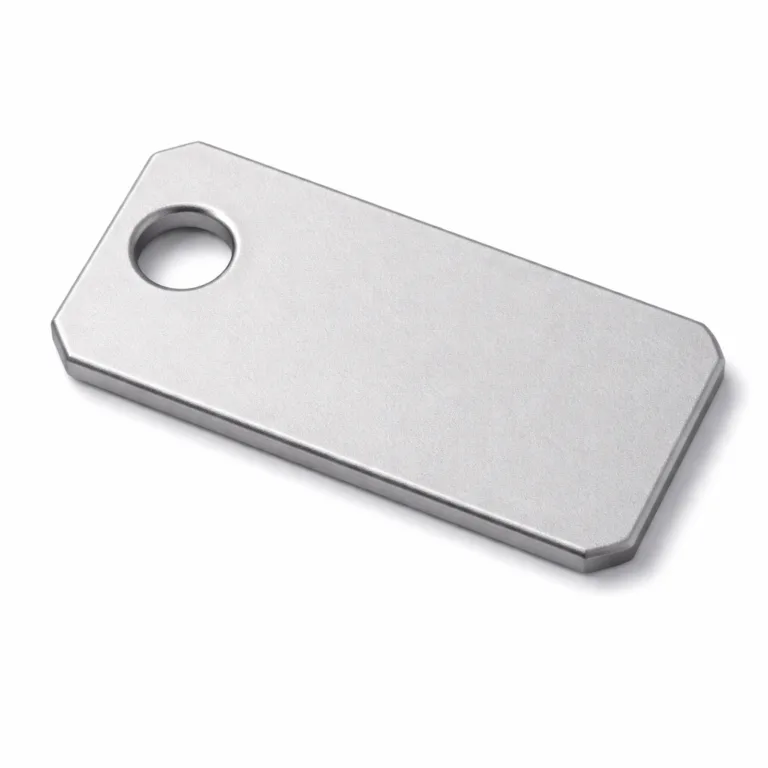 An anodized aluminum bag tag with a sophisticated matte finish and precision beveled edge. The design includes a single large hole for attaching a split ring or chain, suitable for serial number identification.