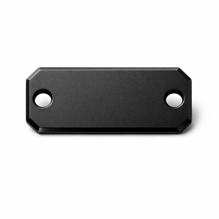 This variant features an anodized aluminum wine tag in a matte black finish, beveled edge, and double holes for a split ring. Designed for durability and a sleek modern look, photographed studio-style.
