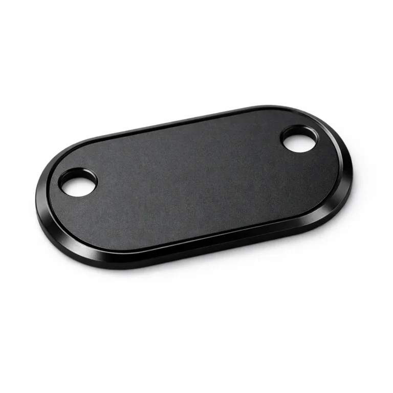 A lightweight wine tag crafted from anodized aluminum with a sleek matte black finish. Features precisely beveled edges and double holes for hanging with a chain, offering both style and functionality for wine presentation.