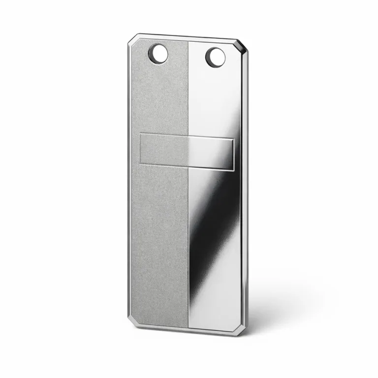 A two-tone bookmark tag produced from anodized aluminum. The design includes one sandblasted matte finished side and a mirror polished accent with beveled edges for a premium look. It features a debossed blank logo area and two punched holes at the top for various attachment options.