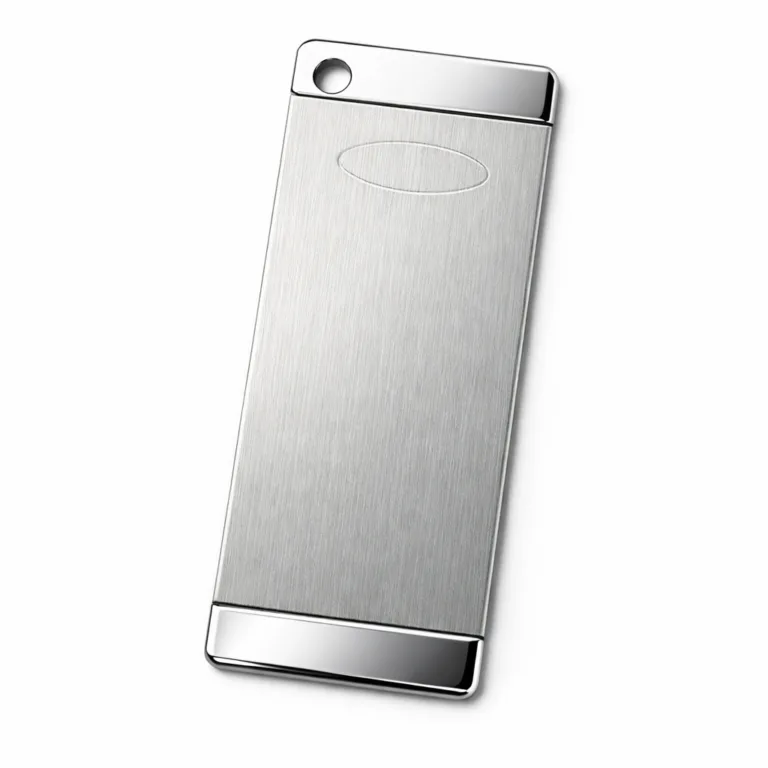 A two-tone bookmark tag manufactured in stainless steel, featuring a brushed main surface with contrasting polished edges. The rectangular design has rounded corners, a single hole on the top left for optional attachment, and a subtle blank emblem for customization.
