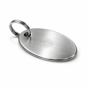 Elegant wine gift message tag crafted from brushed stainless steel. Features an oval design, split ring for easy hanging, and a subtle laser engraved blank emblem for custom branding.
