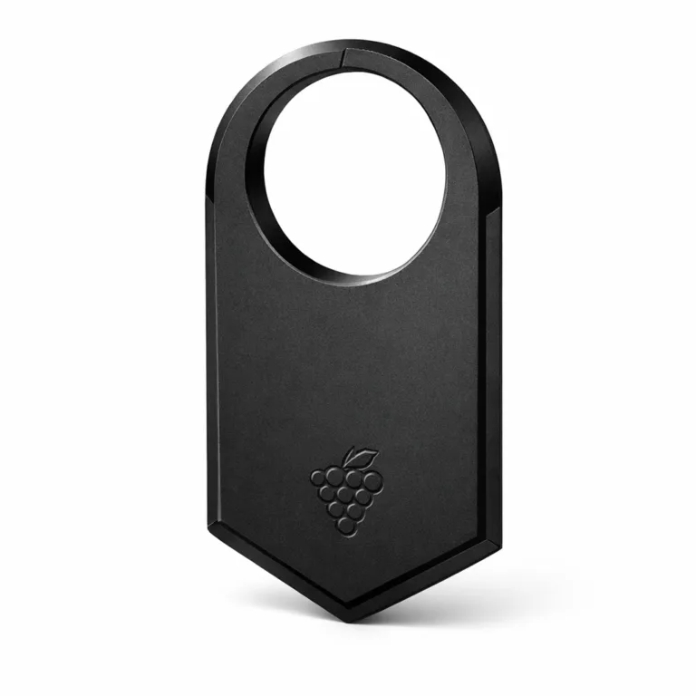 A single matte black anodized aluminum wine tag featuring a smooth matte finish and beveled edge, with a subtle embossed emblem design. Displayed on a white studio background for product presentation.