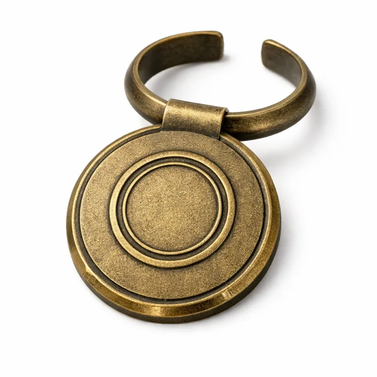 A classic wine tag crafted with antique brass plating, featuring a sandblasted matte surface and chamfered edges. Included is a debossed circular emblem for timeless elegance, ideal for upscale presentations.