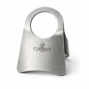 A premium brushed stainless steel wine tag for champagne or wine bottles, featuring rounded corners and a subtle laser-engraved blank emblem on the front. The tag is designed for durability and a sleek modern look, presented in a clean studio setting for e-commerce.