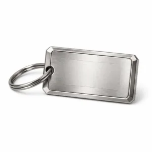 Rectangular zinc alloy luggage tag in brushed nickel, shown with beveled edge, laser-engraved blank emblem, and a classic split ring attachment. Perfect for durable personal identification on bags.