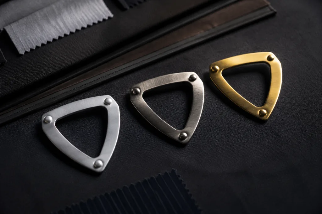Hem vs. Neck Tags: Unlock the Best Metal Logo Placement for Maximum Brand Impact 2 metal logo tag placement materials comparison