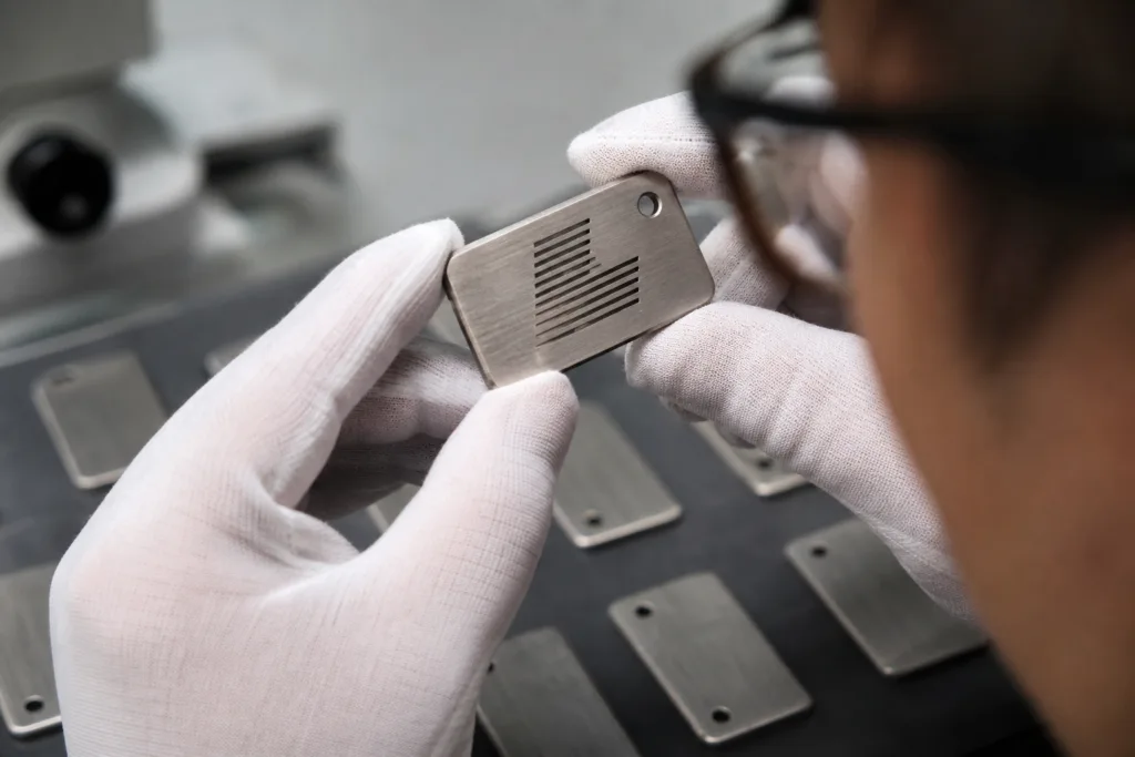 Garment Metal Tags: How to Choose the Right Material, Finish, and Attachment for Apparel Branding 2 garment metal tags marking qc inspection